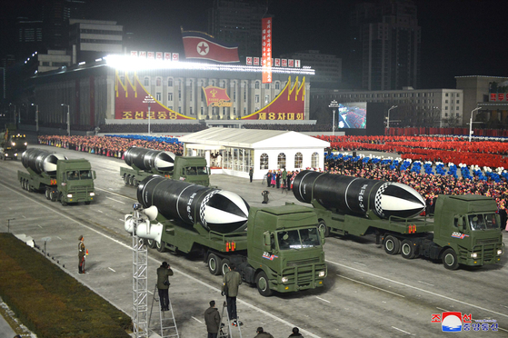 New submarine-launched ballistic missiles, called the Pukkuksong-5, are unveiled at a military parade in Pyongyang Thursday night to mark the close of the Eighth Workers' Party Congress, according to this state media photograph. [YONHAP]