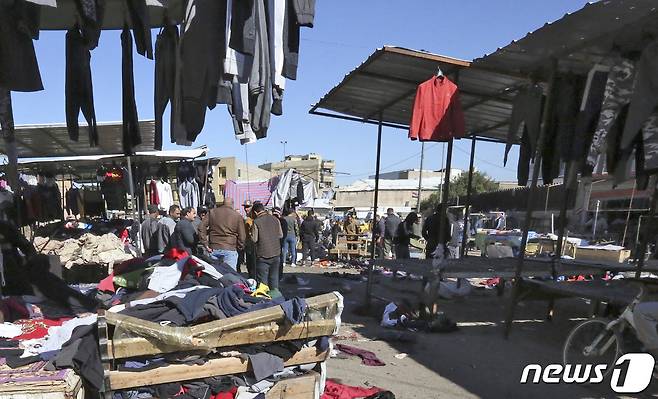 이라크 수도 바그다드의 자살폭탄 테러 현장 © AFP=뉴스1