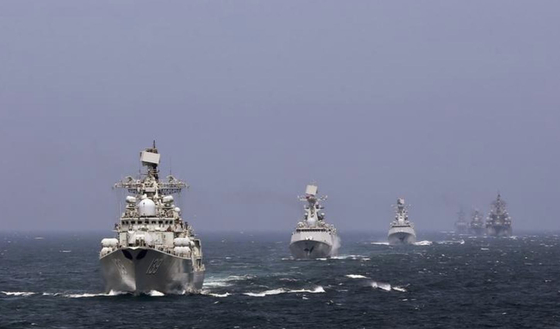 Chinese warships conduct a naval exercise with Russia in 2014. [CHINESE DEFENSE MINISTRY]
