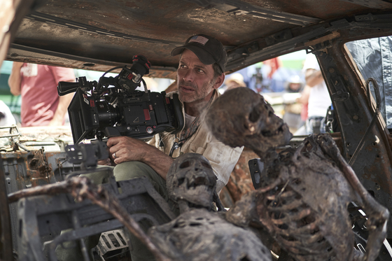 Filmmaker Zack Snyder, who is behind 2004 remake "Dawn of the Dead," "300" (2007), "Man of Steel" (2013), Justice League" and more directed, scripted and acts as a cinematographer for the upcoming zombie film "Army of the Dead," set for release on May 21 on Netflix [NETFLIX]