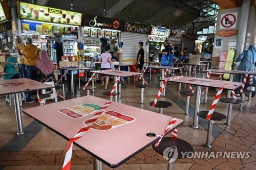 16일부터 배달과 포장만 가능해진 싱가포르 식당 모습. [AFP=연합뉴스]