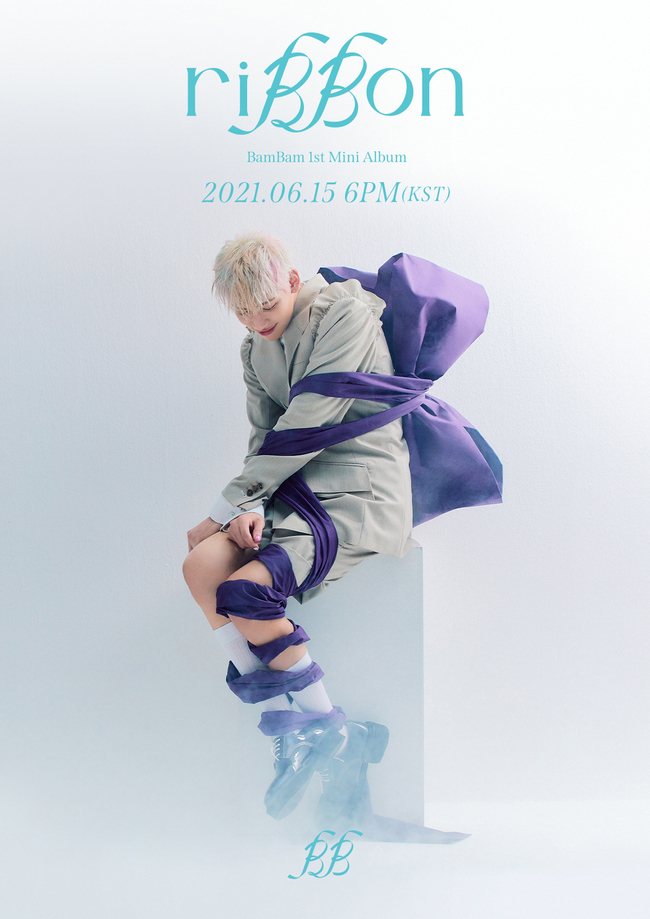 BamBam, who foresaw the release of his first solo album, released Title Poster on Reversal Story.Title Poster, released on May 25 through BamBams official SNS, revealed the image of BamBam full of boyhood along with the letter riBBon which represents the album name.In Poster, BamBam looks happy, with a unique hairstyle with a blonde-based pastel tone and a green-toned shorts suit, as if Packaging and labelling with a large purple ribbon.This Title Poster emanated the charm of BamBam, which is the opposite of the teaser Poster, which felt masculine in black and white.