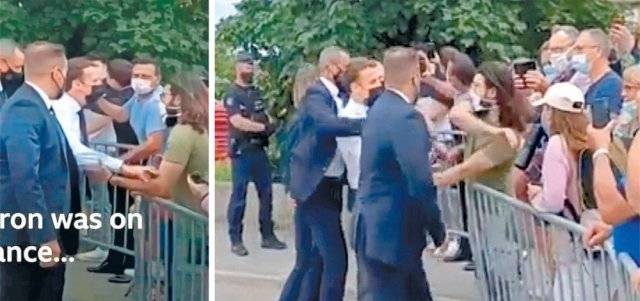 8일 프랑스 남부 소도시 탱레르미타주를 찾은 에마뉘엘 마크롱 대통령. 앞줄에 있는 남성에게 악수를 하려 했지만(왼쪽 사진)
그는 자신의 왼손으로 대통령의 오른손을 잡은 채 오른손으로 대통령의 왼쪽 뺨을 세게 갈겼다. 순식간에 벌어진 일이라 경호원도
제지하지 못했다. BBC 화면 캡처