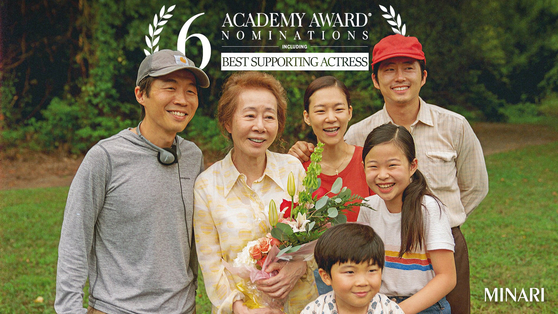 From left, Director Lee Isaac Chung and actors Youn Yuh-jung, Han Ye-ri and Steven Yeun with child actors Alan Kim and Noel Kate Cho [PAN CINEMA]