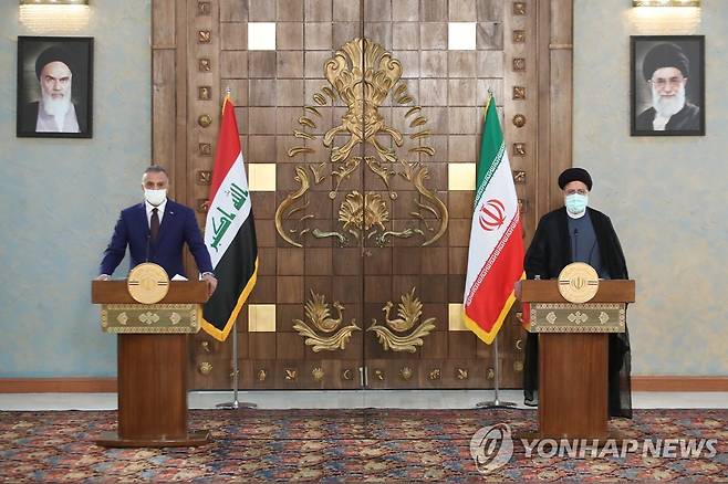 공동 기자회견하는 이란 대통령(오른쪽)과 이라크 총리 [EPA=연합뉴스]