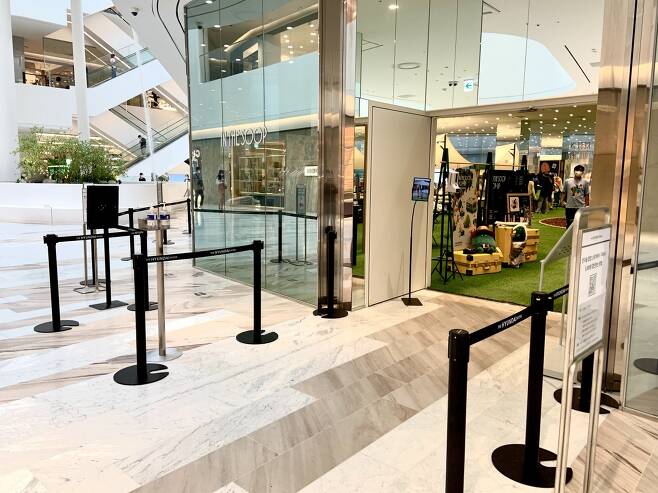 This file photo shows the entrance to the BTS pop-up store at The Hyundai Seoul in Yeouido, western Seoul. (Park Jun-hee/The Korea Herald)