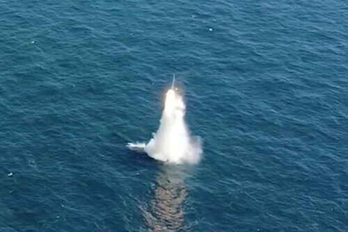 A South Korean-developed submarine-launched ballistic missile (SLBM) is launched from a 3,000-ton class Dosan Ahn Chang-ho-class submarine on Wednesday. President Moon Jae-in, along with other key government and military figures, were present during the test at the Agency for Defense Development’s Anheung Test Center. (provided by the Ministry of National Defense)