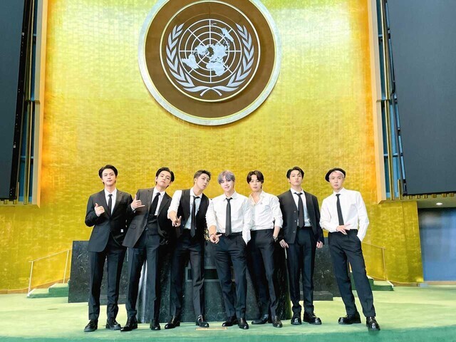 BTS, who participated in the UN General Assembly as a special presidential envoy for future generations and culture, pose for a photo at the UN General Assembly Hall in New York on Monday. (Yonhap News)