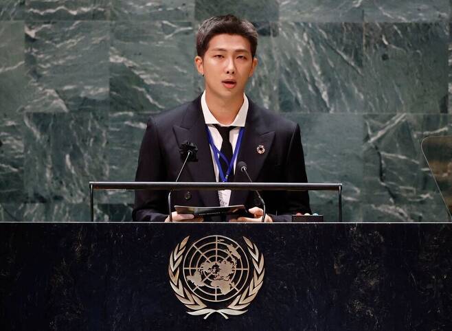 BTS group leader RM speaks at the opening session of the UN's SDG Moment event on Monday in New York. (AFP/Yonhap News)
