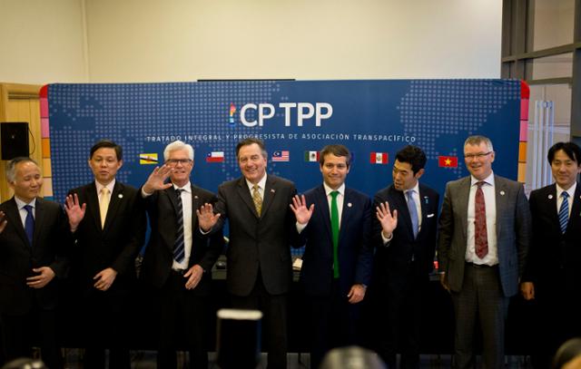 지난 2019년 5월 16일 칠레 산티아고에서 열린 환태평양경제동반자협정(CP TPP) 회의 참석자들이 사진 촬영을 하고 있다. 중국은 지난 16일 TPP 참가를 신청했다. AP 연합뉴스