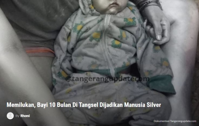 얼굴부터 발까지 은색칠을 하고 구걸에 동원된 10개월 아기의 모습. Tangerangupdate 캡쳐