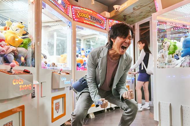 Actor Lee Jung-jae plays debt-ridden divorcee Ki-hoon in “Squid Game” (Netflix)