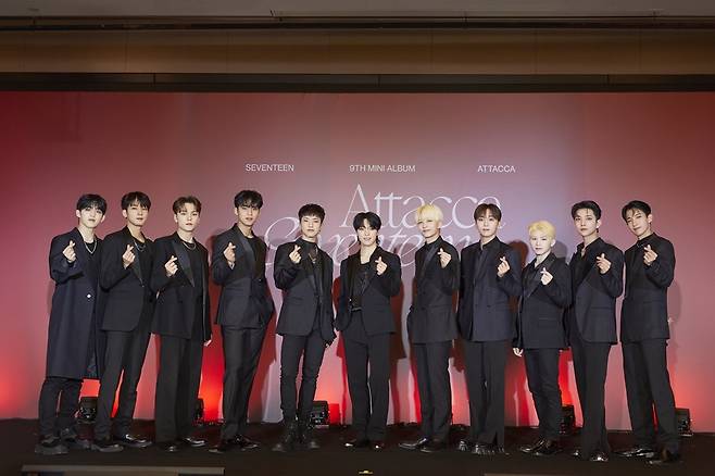 Boy band Seventeen poses during an online press conference Friday. (Pledis Entertainment)