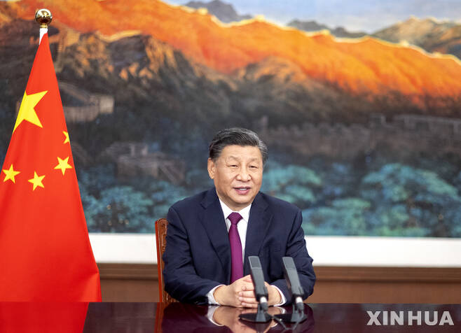 [베이징=신화/뉴시스] 시진핑 중국 국가주석이 18일 베이징에서 열린 중국 국제무역촉진위원회(CCPIT) 창립 70주년 및 세계무역투자촉진정상회의에서 화상 연설을 하고 있다. 2022.05.19.