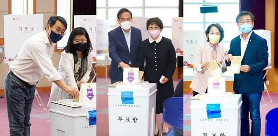 전북교육감 선거에 출마한 김윤태, 서거석, 천호성 후보 내외(왼쪽부터)가 27일 전북도청에서 사전투표를 하고 있다. 연합뉴스