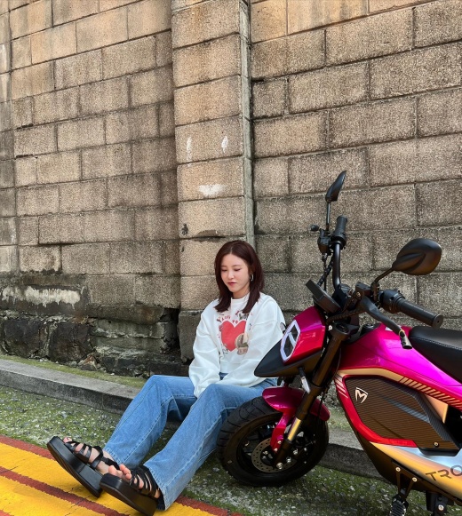 Singer Jun Hyoseong made an eye-catching announcement of his motorcycle.Jun Hyoseong posted several photos on his Instagram on Wednesday and wrote down the comment HotPink.In the photo, Jun Hyoseong is sitting in front of a high stone wall and sitting with a motorcycle with hot pink color.Its a casual atmosphere, matching a cropped one-man T-shirt with jeans, and he even posed on his motorcycle.However, Jun Hyoseong did not explain much about motorcycles, and netizens expressed their curiosity by leaving comments such as It suits well, Do you drive your own motorcycle and Great Pink Love.