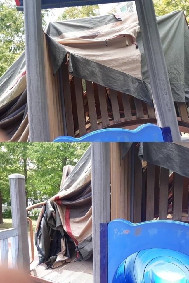 놀이터 미끄럼틀에 텐트가 널린 모습 /사진=온라인 커뮤니티
