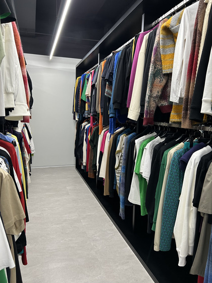 One of the many clothing racks on the first floor of House Wooyoungmi, filled with designer Woo's past collections [SHIN MIN-HEE]
