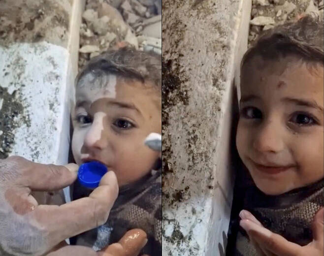 튀르키예 대지진 속 건물 잔해에서 구조된 아이. 구조원이 병뚜껑에 물을 담아 먹이고 있다. (사진=AP, 연합뉴스)