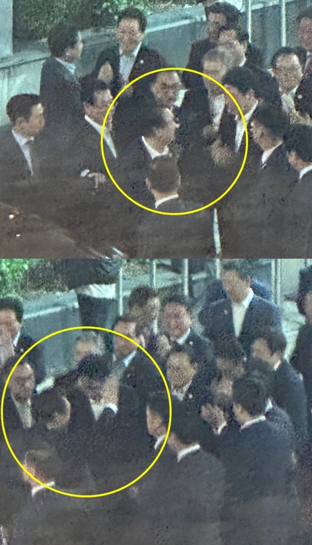 윤석열 대통령이 6일 부산 해운대구 횟집에서 나와 참석자들과 인사를 나누고 있다. 온라인 커뮤니티 캡처