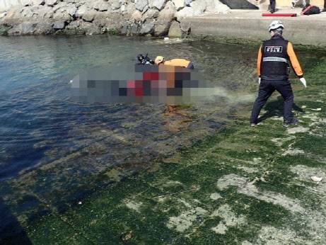 지난해 5월 3일 부산 기장군 일광읍 동백항에서 발생한 ‘동백항 살인 사건’ 현장 모습. 사진=부산소방재난본부.