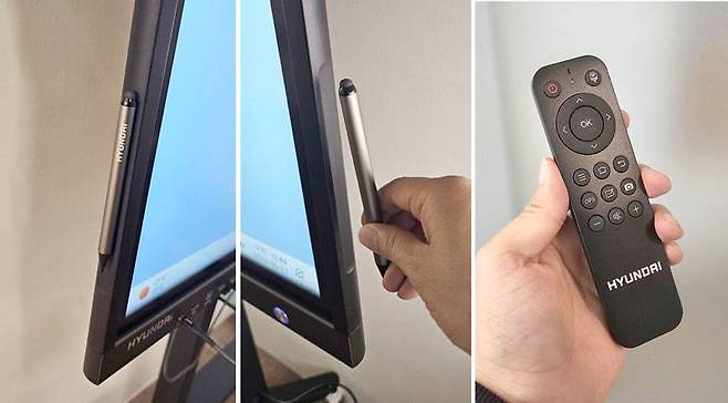 본체 양측면 하단에 탈부착할 수 있는 터치펜 2개, 일반적인 무선 리모컨 1개를 제공한다