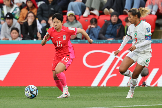 Korea's Chun Ga-ram, left, dribbles the ball during a 2023 Women's World Cup group stage match against Morocco at Hindmarsh Stadium in Australia on July 31, 2023. [YONHAP]