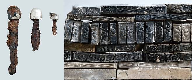 29호분의 재발굴에서 확인된 유물들. 관을 장식한 못과 연꽃무늬·동전무늬 전돌이 보인다. 무령왕릉과 6호분 등 인근 고분 및 다른 지역 고분의 출토유물과 비교하면 29호분은 6세기 중엽 조성된 것으로 짐작된다. /국립부여문화재연구소 제공