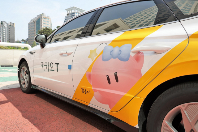 ▲대전시는 지역 대표 캐릭터인 '꿈씨패밀리' 이미지를 입힌 택시를 운영한다. ⓒ대전시