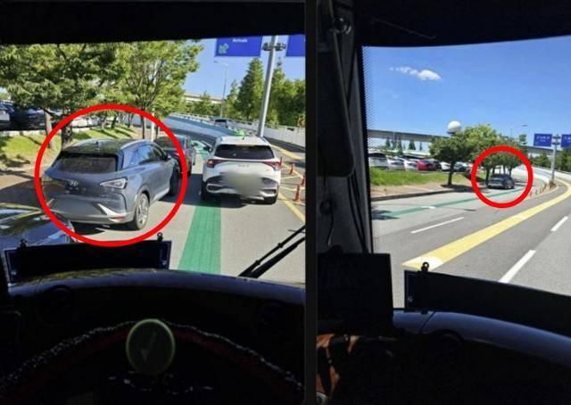 김해국제공항 도착층 진입로에 차량 한 대(빨간 원형)가 주차돼 있다. 지난달 30일 한 SNS 계정에 올라온 이 사진은 버스 내에서 촬영된 것으로 추정된다. SNS 캡처