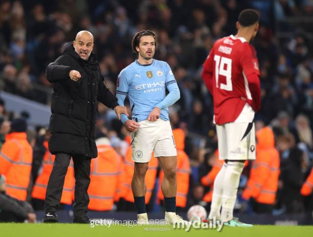 맨체스터 시티 잭 그릴리시와 펩 과르디올라 감독./게티이미지코리아