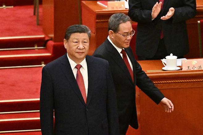 시진핑 중국 국가주석이 지난 10일(현지시간) 베이징 인민대회당에서 열린 전국인민정치협상회의(정협) 폐막식에 리창 총리와 도착을 하고 있다. /AFPBBNews=뉴스1