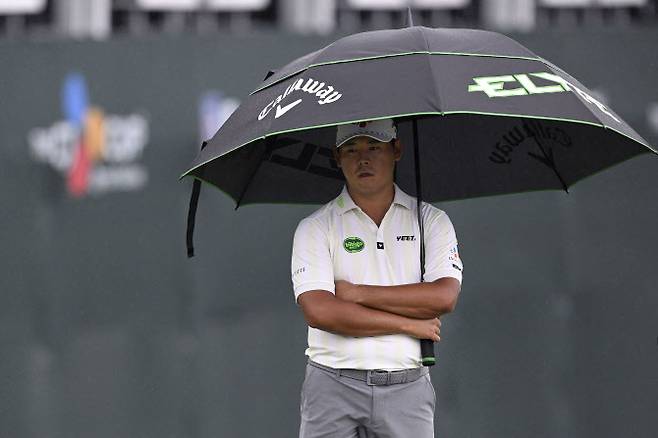 비가 내리는 가운데 프로암에 참여한 김시우(사진=AFPBBNews)