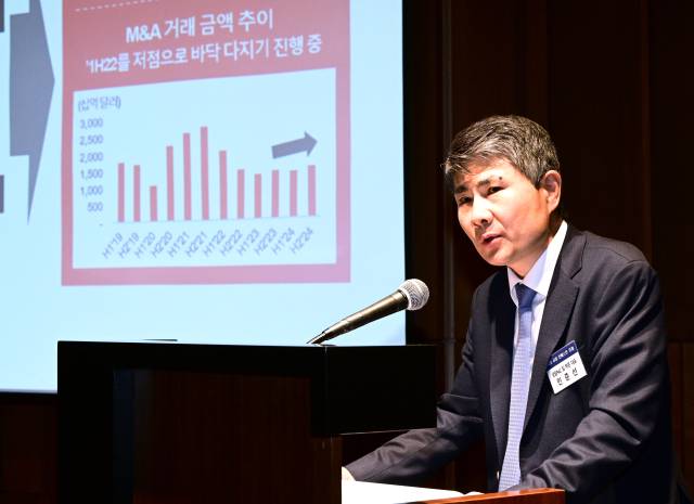 민준선 삼일PwC 딜부문 대표가 8일 서울 중구 신라호텔에서 열린 제13회 서경 인베스트 포럼에서 ‘A.C.T.I.V.E한 환경에 P.R.O.M.I.S.E로 대응하라-한국 기업 및 투자자 대응 전략’을 주제로 발표하고 있다. 권욱 기자