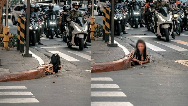 지난달 26일 필리핀 미카타시의 번화가 모퉁이 하수구에서 여성 노숙자가 기어 나오는 모습. (사진은 William Roberts 인스타그램 갈무리)