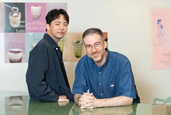 Park Chun-hue (left) and Will Aronson (CJ ENM)