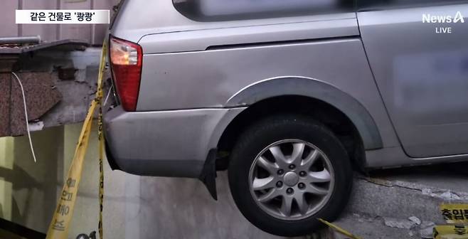 9일 오전 5시경 서울 서대문구 홍은동 한 골목길을 오르던 승합차가 뒤로 미끄러져 빌라 건물과 충돌했다. 뒷바퀴가 도로를 이탈해 들려 있는 모습. (제보자 제공) 채널A
