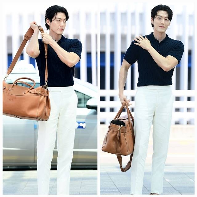 배우 김우빈이 밀라노로 향하는 길 팬들을 향한 사랑과 설렘을 가득 채운 듯한 가방으로 눈길을 사로잡았다. 사진=김영구 기자