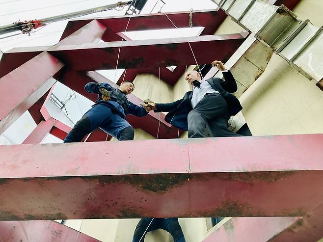 Andreas Fronk (right) on the set of "Carter" with actor Joo Won (Courtesy of Fronk)