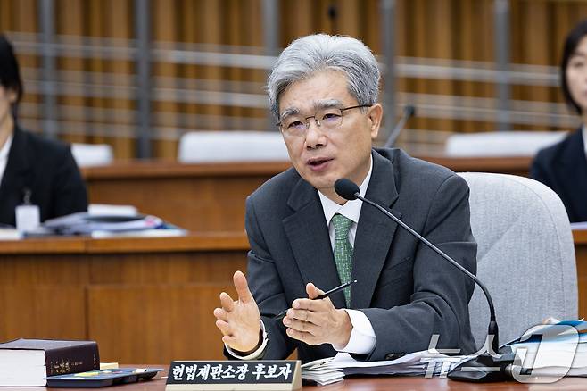 김상환 헌법재판소장 후보자가 21일 서울 여의도 국회 헌법재판소 재판관후보자를 겸하는 헌재소장 임명동의에 관한 인사청문특별위원회에서 열린 인사청문회에서 의원 질의에 답하고 있다. 2025.7.21/뉴스1 ⓒ News1 유승관 기자