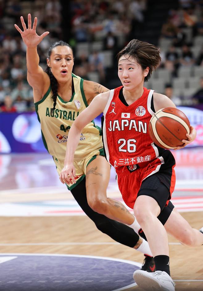 <yonhap photo-4507="">호주와 결승전에서 플레이하는 다나카 코코로(오른쪽). 신화=연합뉴스 </yonhap>