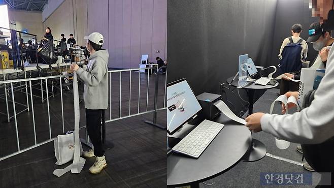 관람객들이 지난 31일 블루 아카이브 4주년 페스티벌에서 게임 이용 지표를 영수증 형식으로 뽑고 있다. 사진=박수빈 기자