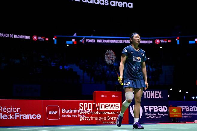 Ahn Se-young in action on the badminton court.