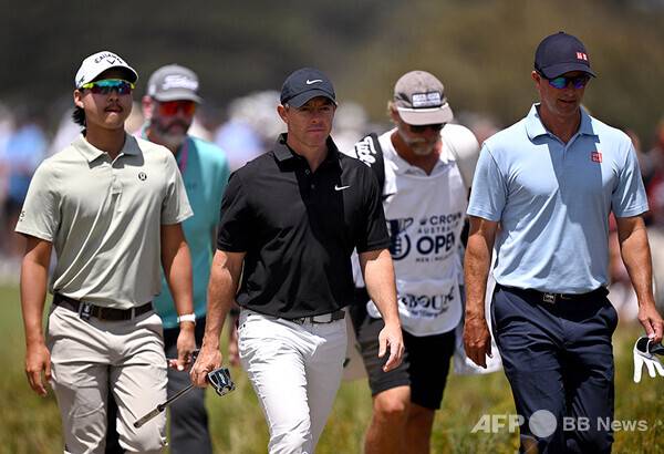 2025년 12월 DP월드투어(옛 유러피언투어) 2026시즌 대회인 크라운 호주 오픈에 출전한 이민우(호주) 프로와 로리 맥길로이(북아일랜드), 애덤 스콧(호주)이 2라운드에서 동반 경기하는 모습이다. 사진제공=ⓒAFPBBNews = News1 (사진을 무단으로 사용하지 마십시오.)