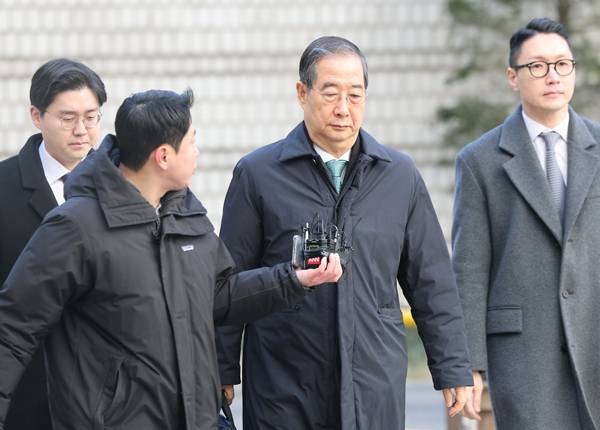 ▲ 내란 우두머리 방조 혐의를 받는 한덕수 전 국무총리가 1월21일 서울중앙지법에서 열린 1심 선고 공판에 출석하고 있다. ⓒ연합뉴스