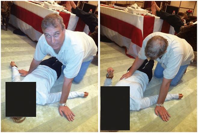 30일(현지시간) 미국 워싱턴DC에서 미 법무부가 공개한 제프리 엡스타인 관련 수사 자료에서 영국 앤드루 왕자가 한 여성 위에 무릎을 꿇은 채 있는 모습이 담겼다. /로이터=뉴스1