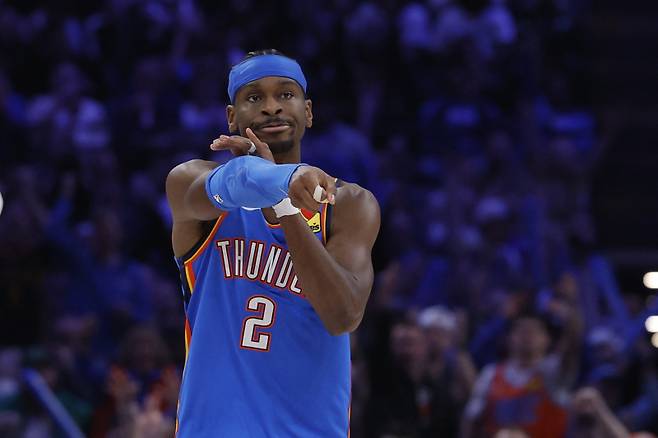 Mar 12, 2026; Oklahoma City, Oklahoma, USA; Oklahoma City Thunder guard Shai Gilgeous-Alexander (2) gestures after scoring a basket against the Boston Celtics during the second quarter at Paycom Center. Mandatory Credit: Alonzo Adams-Imagn Images