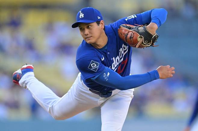 LA 다저스의 오타니 쇼헤이가 25일(한국시간) 미국 캘리포니아주 로스앤젤레스 다저스타디움에서 열린 LA 에인절스와의 2026 메이저리그 시범경기에서 역투하고 있다. 로이터연합뉴스