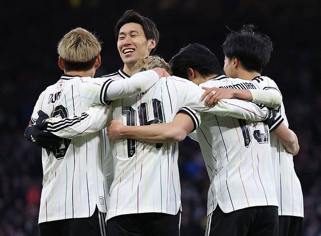 Soccer Football - International Friendly - Scotland v Japan - Hampden Park, Glasgow, Scotland, Britain - March 28, 2026 Japan's Junya Ito celebrates scoring their first goal with teammates REUTERS/Russell Cheyne
<저작권자(c) 연합뉴스, 무단 전재-재배포, AI 학습 및 활용 금지>