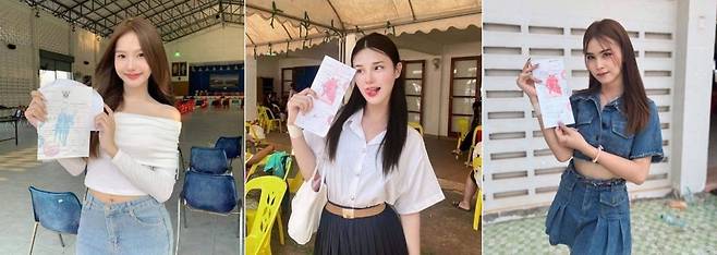 태국의 징병 추첨장에서 나선 미모의 여성들 모습. 이들은 '성전환 수술 증명서' 등을 지참하고 징병 면제를 신청했다. 태국 병역법에 따르면 장애인이나 불교 교육 수준이 높은 승려들은 징집에서 면제된다. 성전환 수술을 받은 트랜스젠더 역시 면제다.(뉴시스)